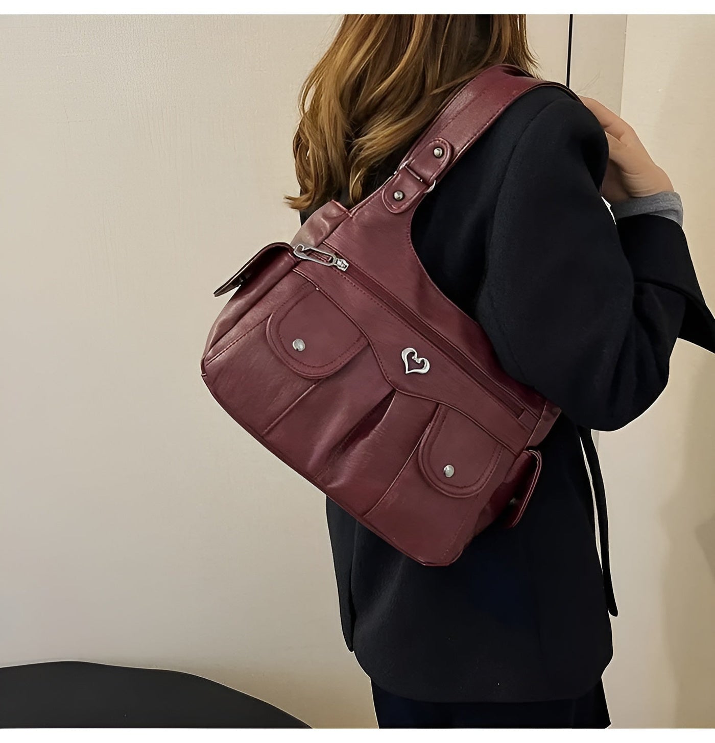 Hobo™ – Axelväska i diskret lyxstil