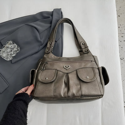 Hobo™ – Axelväska i diskret lyxstil
