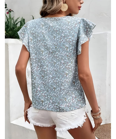 Alba™ – Blommig blus med charm och lätt elegans
