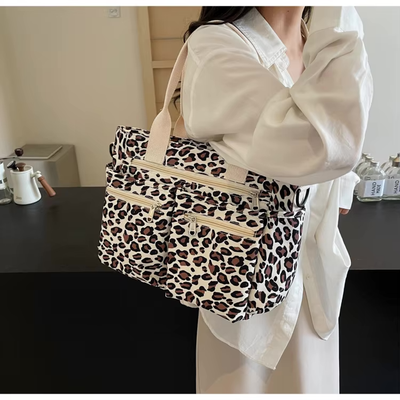 Tessi™ – Axelväska med leopardmönster
