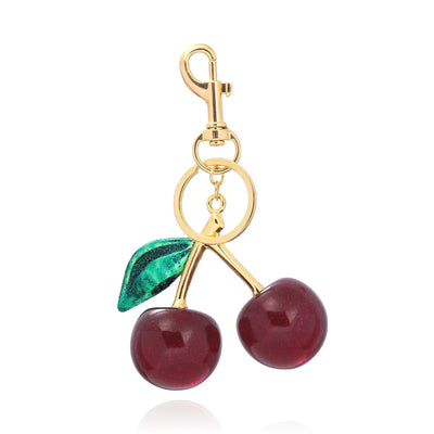 Cherry Chic™ – väsksmycke
