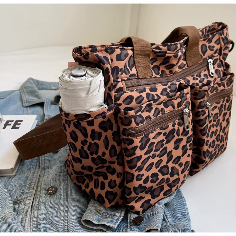 Tessi™ – Axelväska med leopardmönster