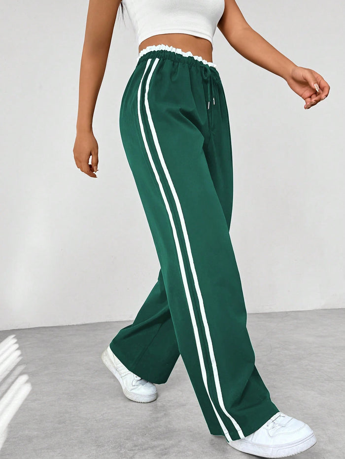 Kaeli™ – Sportiga joggingbyxor med ränder