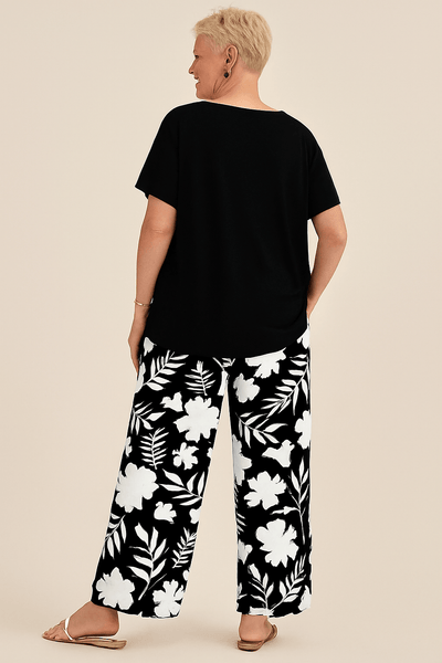 Ebba™ – Somrigt set med blommiga vida byxor & lös topp